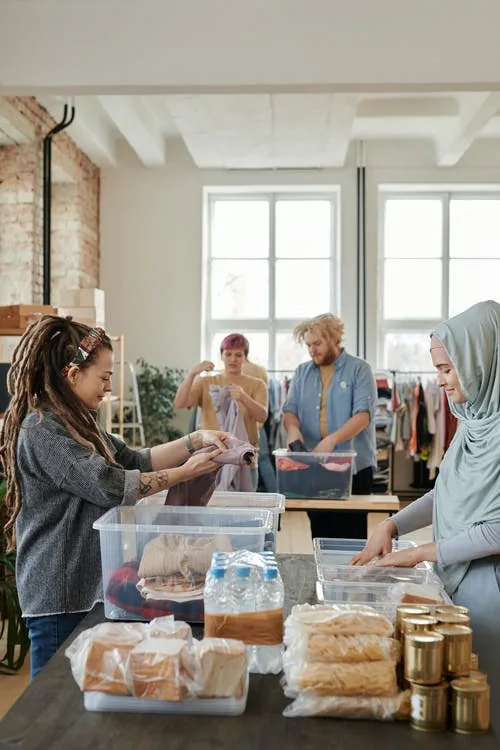 group of people donating ond sending humanitarian help to those in need