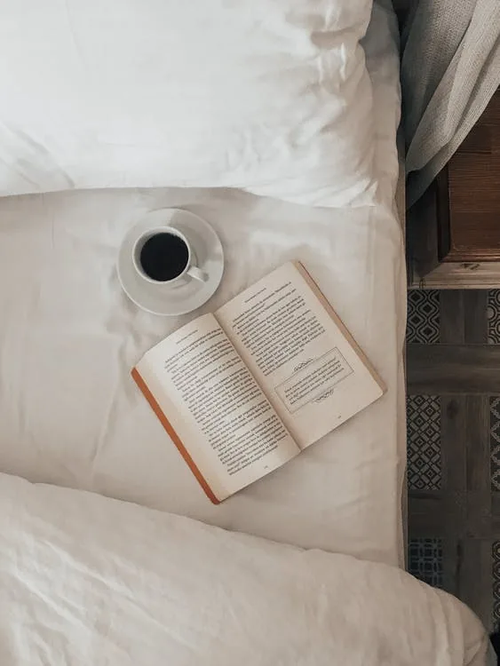 Morning mindful rituals. A cup of coffee and a good book.